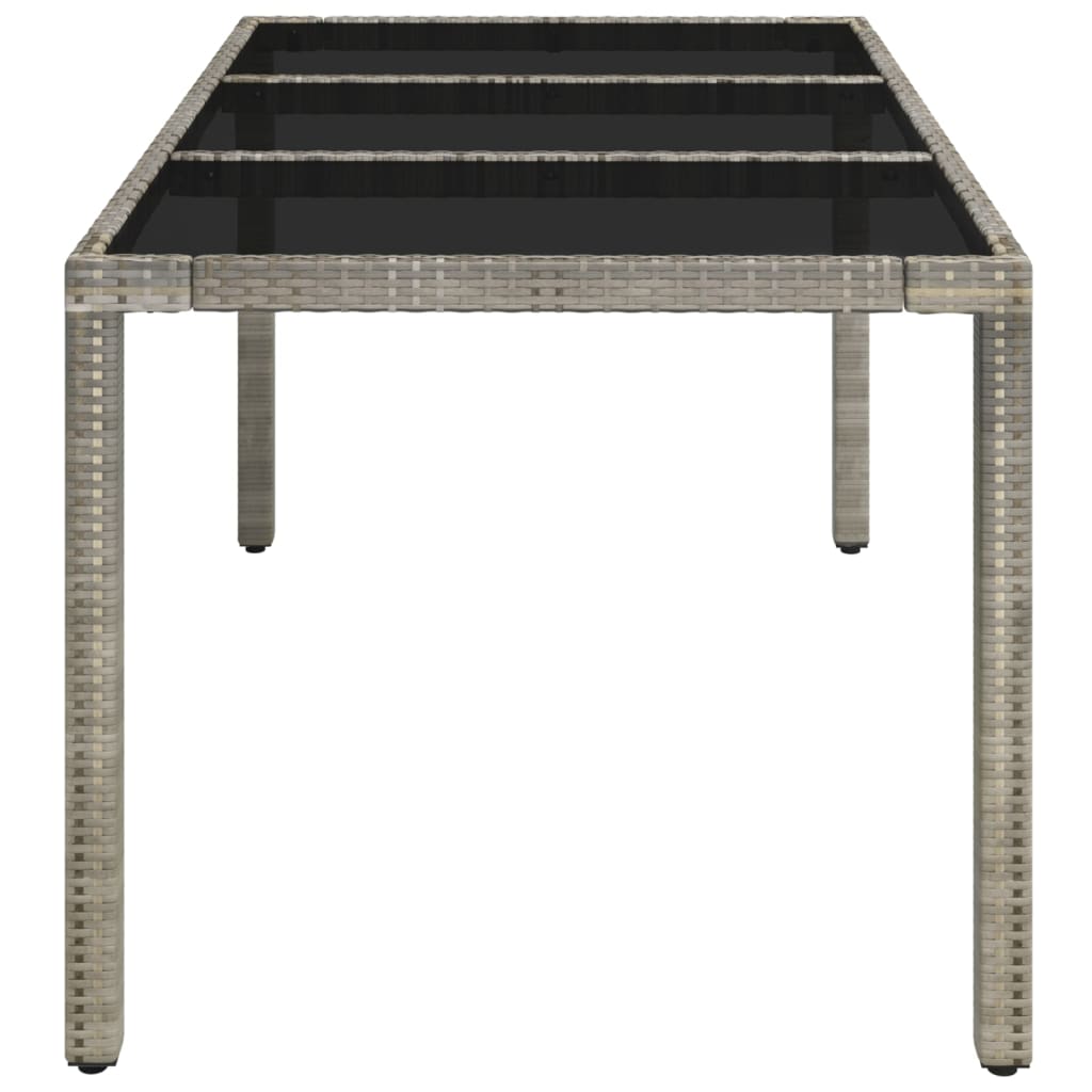 Tuintafel met glazen blad 150x90x75 cm poly rattan grijs