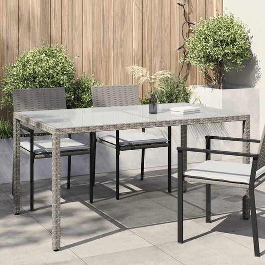 Tuintafel 150x90x75 cm gehard glas en poly rattan grijs
